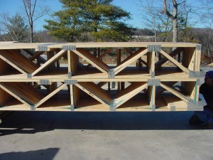 Floor trusses stacked on each other. Picture from this website.